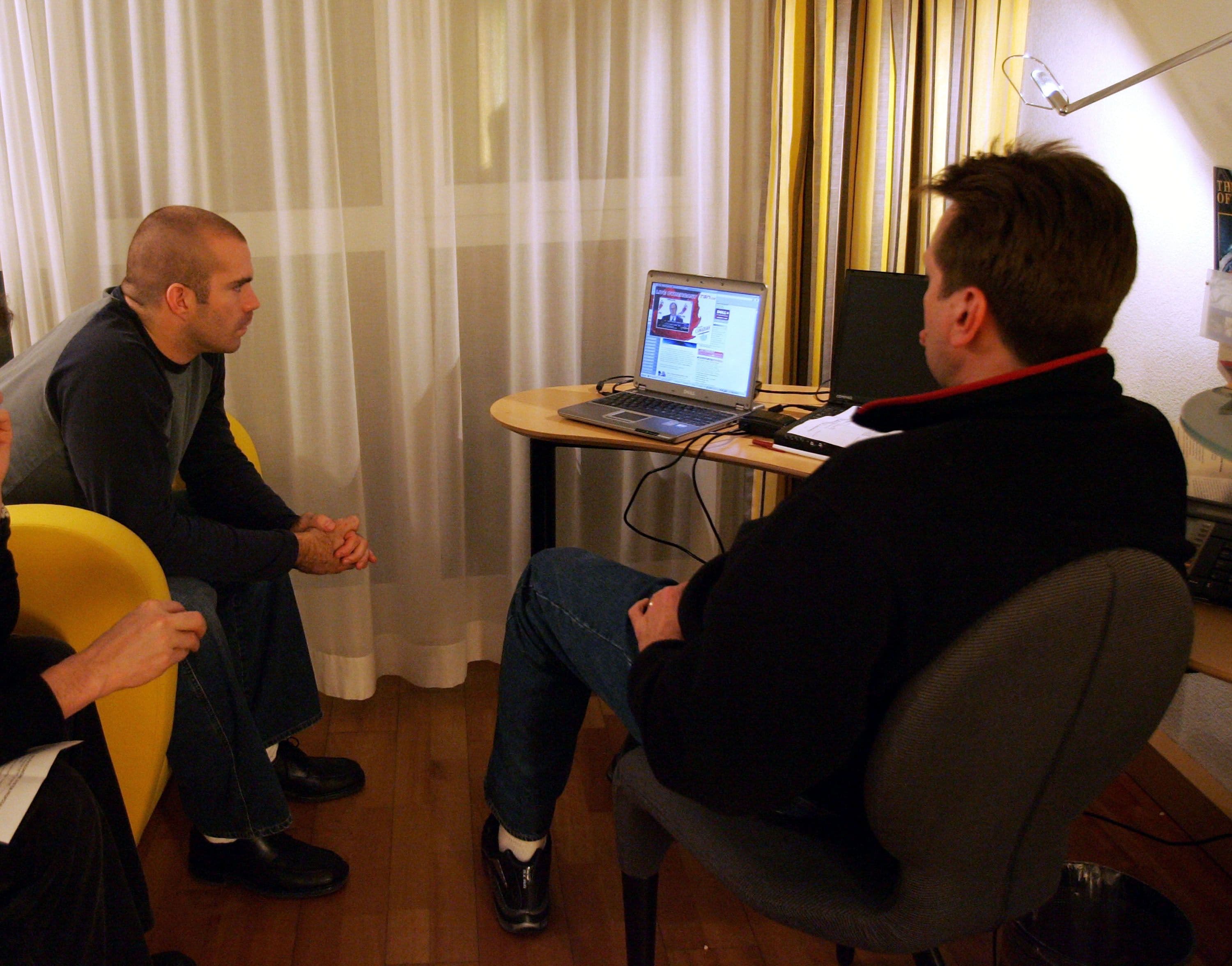 NHL Players watching the NHL Commissioners Announcement cancelling the 2004-2005 season