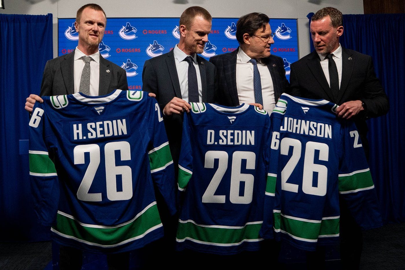 Vancouver Canucks name Johnson GM, Sedins co-presidents of hockey operations